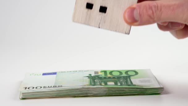 Hand Places Cracked Wooden House Model Stack Euro Banknotes Close — Stock video