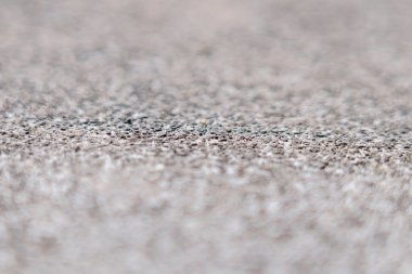Rough concrete floor surface. Macro shot. Selective focus