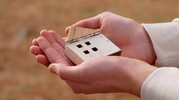 Wooden House Model Hands Property Concept — Stock video
