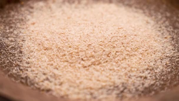Pile Psyllium Seed Husks Wooden Bowl Water Superfood Drinking Supplement — Stock Video