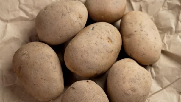 Piațați Cartofii Organici Hârtie Ambalaj Maro Aproape Rotație — Videoclip de stoc