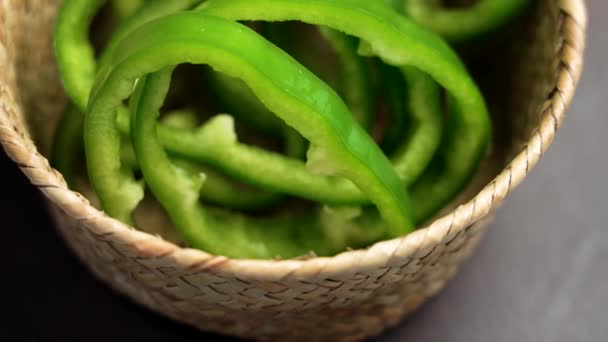 Fresh Sliced Green Bell Peppers Wicker Kitchen Bowl Wooden Table — Stock Video