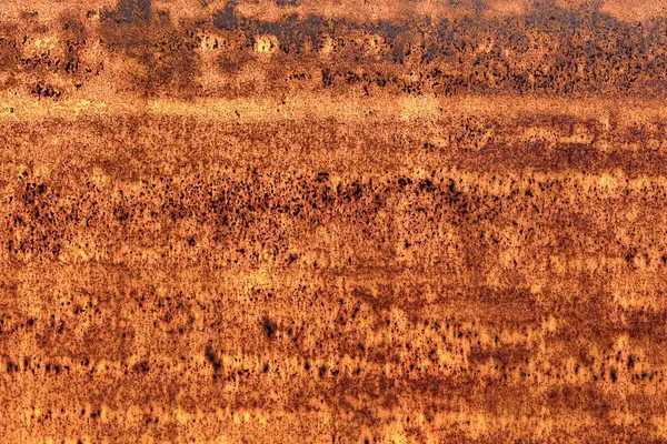 Paslanmış eski grunge yüzeyli paslı demir çarşaf. Soyut sanayi geçmişi