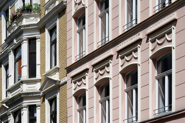 stock image renovated facades of pastel colored and richly decorated residential houses from the end of the 19th century in cologne's eigelstein quarter