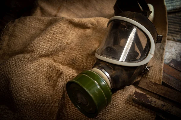 Respirator. Protective mask against gas and chemical attack. Old protective mask.