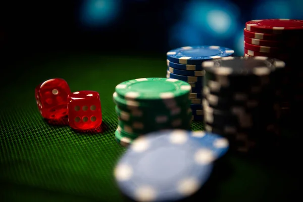 Casino Game Chips Dice Lie Table Blurred Dramatic Background Game — Stock Photo, Image
