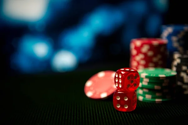 Casino Game Chips Dice Lie Table Blurred Dramatic Background Game — Stock Photo, Image