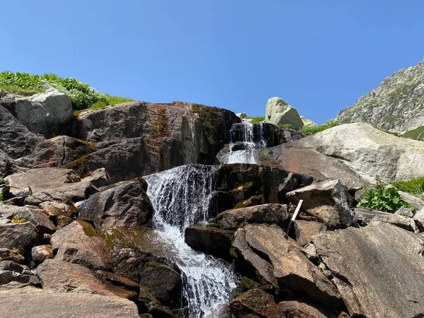 Stock image Mountain waterfalls and cascades of alpine streams in the area of the mountain Gotthard Pass (Gotthardpass) in the Swiss Alps, Airolo - Canton of Ticino (Tessin), Switzerland (Schweiz)