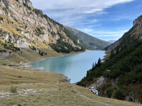 stock image The reservoir lake Panixersee (Lag da Pigniu) or Panixer Lake on the slopes of the Glarus Alps mountain massif, Pigniu-Panix - Canton of Grisons, Switzerland (Kanton Graubuenden, Schweiz)