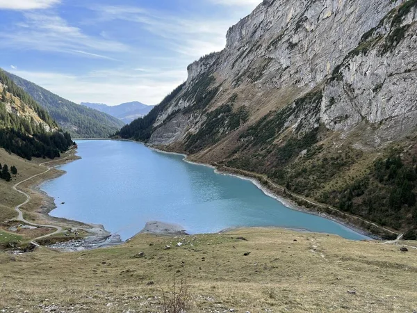 stock image The reservoir lake Panixersee (Lag da Pigniu) or Panixer Lake on the slopes of the Glarus Alps mountain massif, Pigniu-Panix - Canton of Grisons, Switzerland (Kanton Graubuenden, Schweiz)