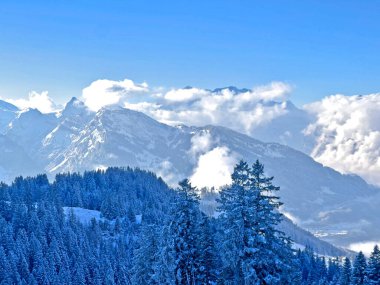 Beautiful low winter clouds and fog condensation in the Swiss Alps during a polar cold snap, Amden - Canton of St. Gallen, Switzerland / Schweiz