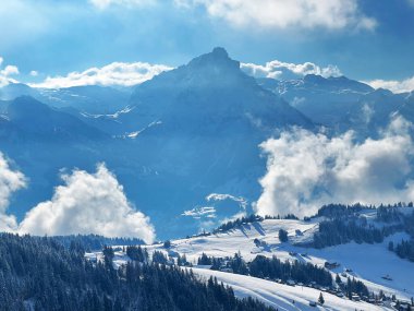 Beautiful low winter clouds and fog condensation in the Swiss Alps during a polar cold snap, Amden - Canton of St. Gallen, Switzerland / Schweiz