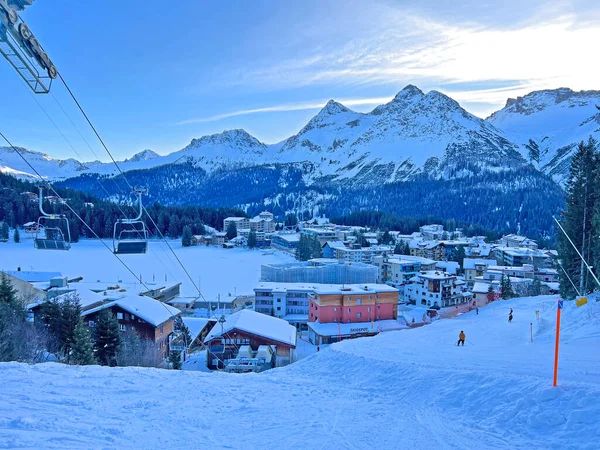 An early frosty morning in the snow-covered Swiss tourist alpine resort of Arosa - Canton of Grisons, Switzerland (Schweiz)