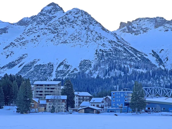 An early frosty morning in the snow-covered Swiss tourist alpine resort of Arosa - Canton of Grisons, Switzerland (Schweiz)
