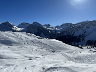 Amazing sport-recreational snowy winter tracks for skiing and snowboarding in the alpine Swiss tourist resort of Arosa - Canton of Grisons, Switzerland (Schweiz)