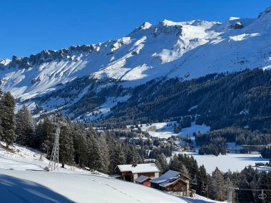 A fairytale winter atmosphere and a magnificent panorama on the mountine tourist resorts of Valbella and Lenzerheide in the Swiss Alps - Canton of Grisons, Switzerland (Schweiz)