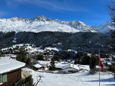 A fairytale winter atmosphere and a magnificent panorama on the mountine tourist resorts of Valbella and Lenzerheide in the Swiss Alps - Canton of Grisons, Switzerland (Schweiz)