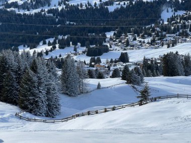 A fairytale winter atmosphere and a magnificent panorama on the mountine tourist resorts of Valbella and Lenzerheide in the Swiss Alps - Canton of Grisons, Switzerland (Schweiz)