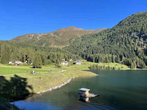 stock image A famous Swiss mountain Lake Davos for sports and relaxation in the heart of the Alps (Davosersee oder Davoser See), Davos Dorf - Canton of Grisons, Switzerland (Kanton Graubuenden, Schweiz)