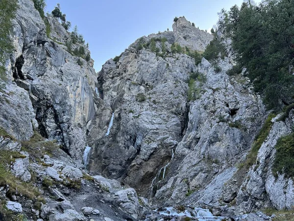 stock image Lower waterfall on the mountain stream Ducanbach or Ducanfall I (Waterfall Ducanfall 1 or Waterfall Ducan I) in the Swiss Alps, Davos - Canton of Grisons, Switzerland (Kanton Graubuenden, Schweiz)