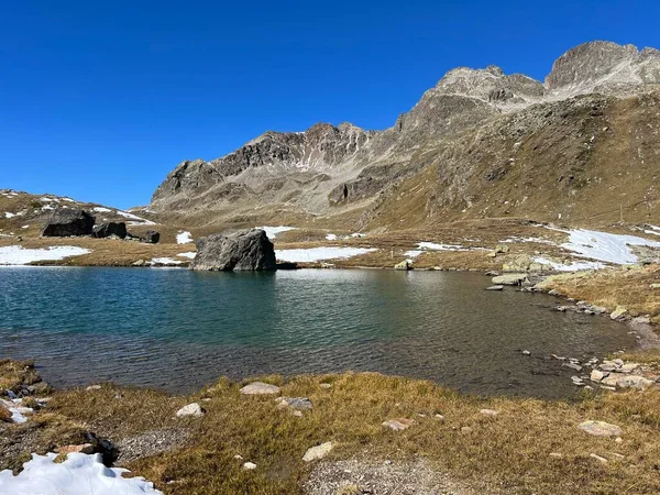 stock image High alpine lakes next to the mountain hut (Chamanna da Grialetsch CAS or Grialetsch-Huette SAC) in the massif of the Albula Alps, Zernez - Canton of Grisons, Switzerland (Kanton Graubuenden, Schweiz)