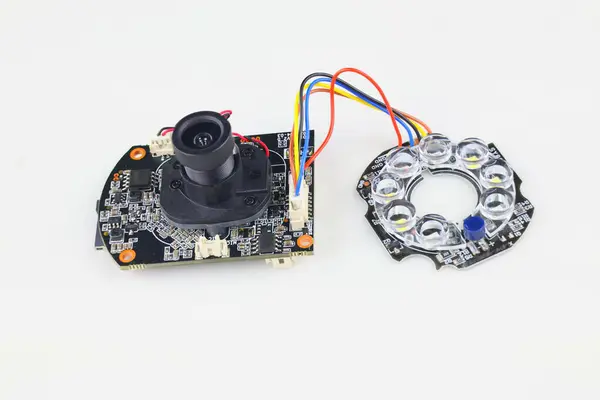 The image prominently displays the individual parts of a smart bulb camera, including the bulb housing, internal circuit board, camera module, and LED array.