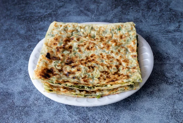 stock image Turkish pancakes with herbs and cheese; Turkish name is hair pastry ( Pancake )