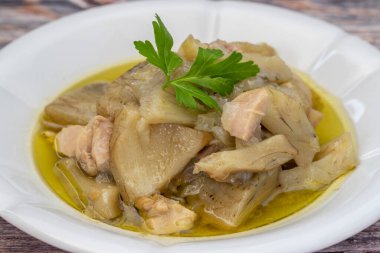 Olive oil artichoke dish cooked with lamb meat