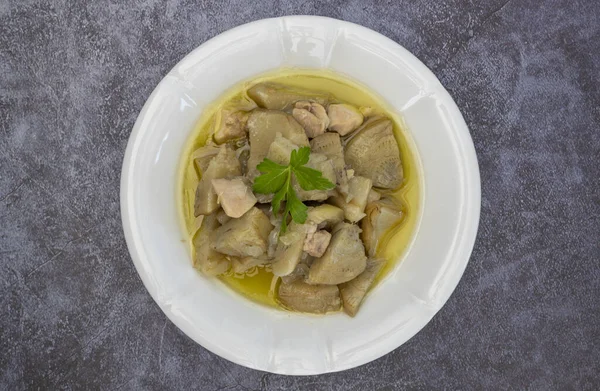 Olive oil artichoke dish cooked with lamb meat