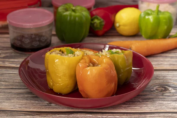 Stuffed peppers, colorful peppers stuffed with rice, top view. (Turkish name; stuffed peppers)