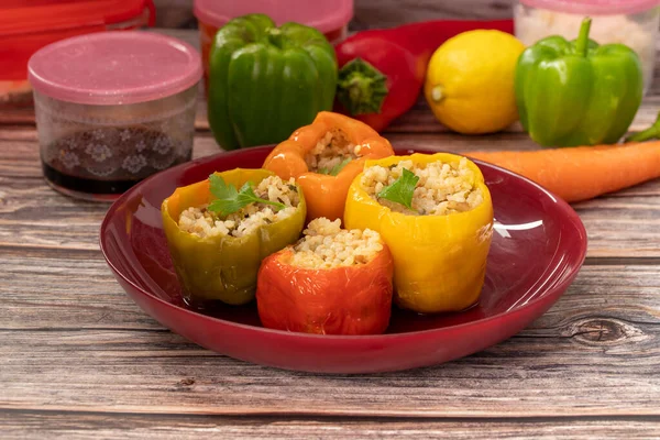 Stuffed peppers, colorful peppers stuffed with rice, top view. (Turkish name; stuffed peppers)