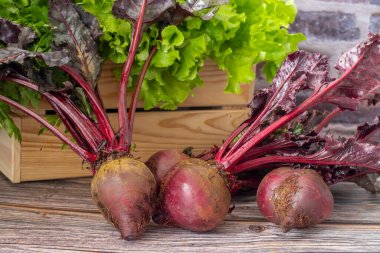 Red beets on wooden table