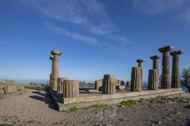 The Temple of Athena ruin in Assos Ancient City. Panoramic view Drone shots. Canakkale, Turkey. clipart