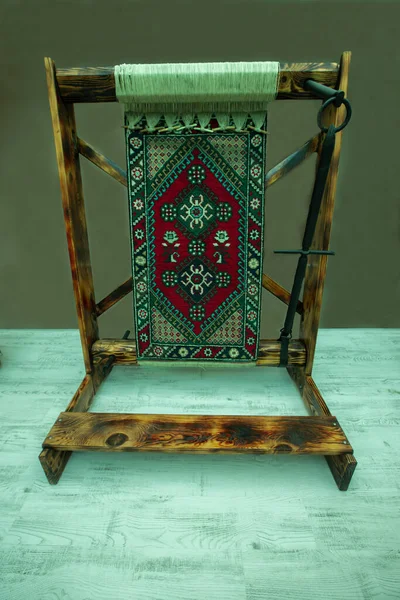 Home style carpet weaving loom in Turkey.