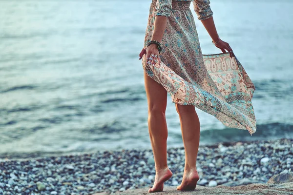 Boho Woman Long Legs Waving Dress Standing Stone Seashore Sunset — Stock Photo, Image