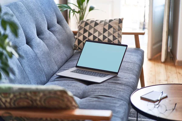 Comfy cozy homely workspace with laptop for remote working and online education. Mockup