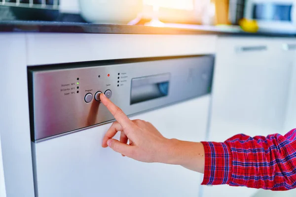 Female Finger Presses Start Button Dishwasher — Stock Photo, Image
