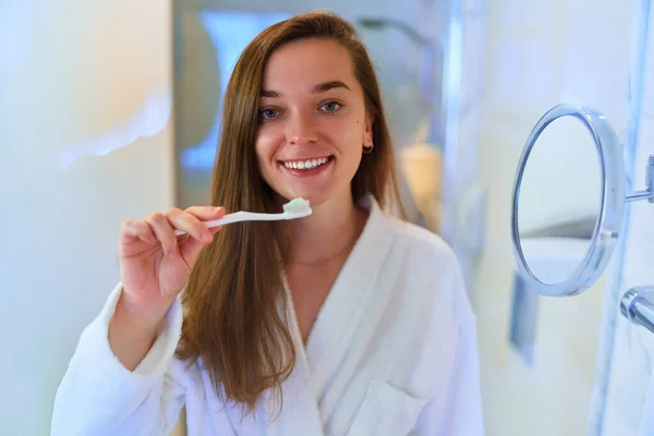 Young Beautiful Happy Girl Wearing Soft White Bathrobe Brushing Her — Stok Foto