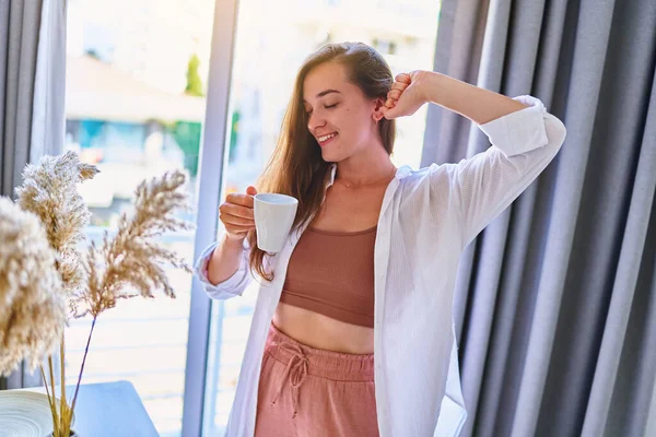 Satisfied Carefree Casual Young Beautiful Happy Smiling Woman Drinking Coffee — Stock Photo, Image