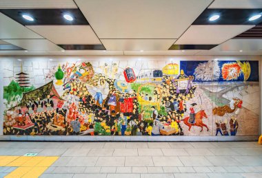 asakusa, tokyo, japan - may 17 2024: Colorful ceramic mural fresco located in Asakusa subway station vividly depicting the annual traditional Japanese Sanja Matsuri festival crowds holding mikoshi. clipart