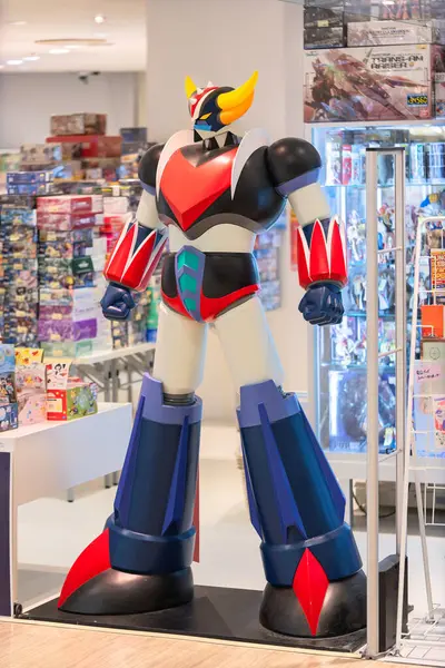 stock image tokyo, ikebukuro - may 13 2019: Large figurine of the Japanese anime 'UFO Robot Grendizer' aka 'Goldorak' created by Go Nagai standing at the entrance of an anime shop in Marui Department Store.