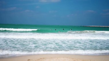  Kite surfers on the waves, on a beautiful beach in the Dubai, UAE. slow motion