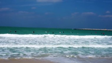  Kite surfers on the waves, on a beautiful beach in the Dubai, UAE. slow motion