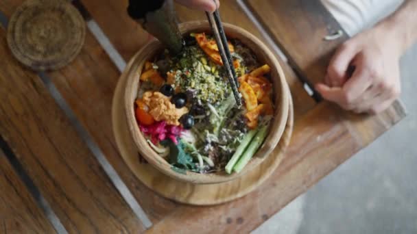Close Female Hands Eat Salad Chinese Chopsticks Top View Organic — Stock Video