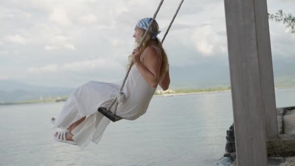 Woman Swinging Rope Swing Tropical Island Holiday Resort Side View — Stock Video
