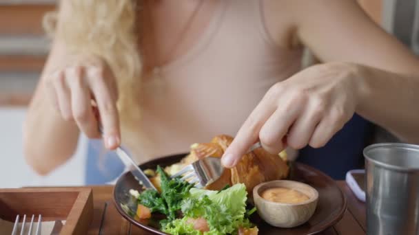 Close Woman Knife Fork Hands Cut Croissant Mozzarella Salad Leaves — Stock Video