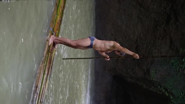 Man Long Black Hair Beautiful Torso Floats Wooden Raft Mountain — Stock Video