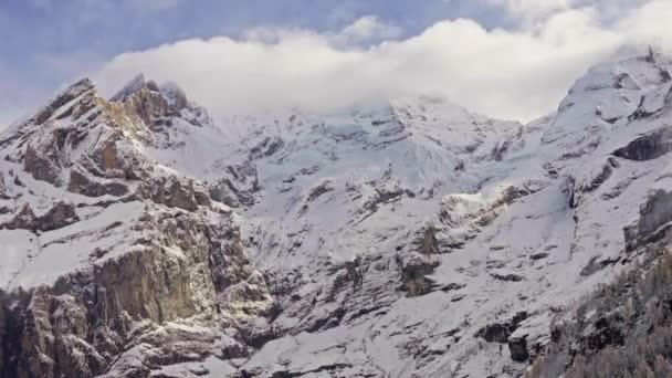 瑞士阿尔卑斯山雪原背景的时间差 瑞士阿尔卑斯山的时间流逝 雪山白云密布 高质量的4K镜头 — 图库视频影像