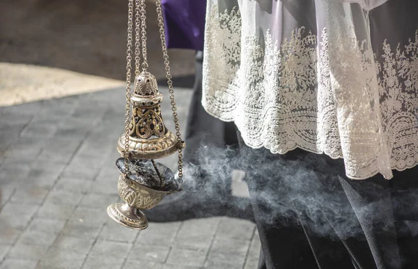 stock image Detail of altar boy dressed in lace with censer in a Holy Week procession in Murcia, Spain