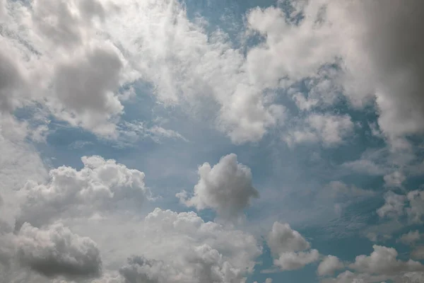 stock image Intense and bright blue sky with abundant white cirrus clouds perfect for backgrounds and graphic resources